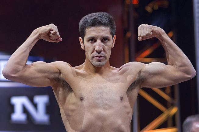 Super lightweight boxer John Molina of Covina, Calif. poses during an official weigh-in at the MGM Grand Garden Arena Friday, March 6, 2015. Molina will take on Adrien Broner of Cincinnati, Ohio at the arena Saturday. The fight will be broadcast live on NBC Sports Network Saturday, March 7.