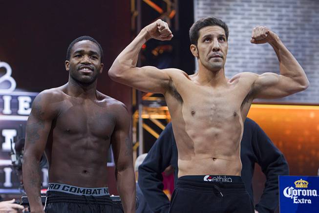 Super lightweight boxers Adrien Broner, left, of Cincinnati, Ohio and John Molina of Covina, Calif. pose during an official weigh-in at the MGM Grand Garden Arena Friday, March 6, 2015. The fight will be broadcast live on NBC Sports Network Saturday, March 7.