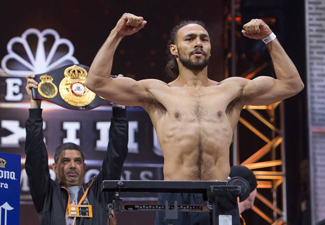 WBA welterweight champion Keith Thurman of Clearwater, Fla. poses on the scale during an official weigh-in at the MGM Grand Garden Arena Friday, March 6, 2015. Thurman will defend his title against Robert Guerrero of Gilroy, Calif. at the arena Saturday. The fight will be broadcast live on NBC Sports Network.