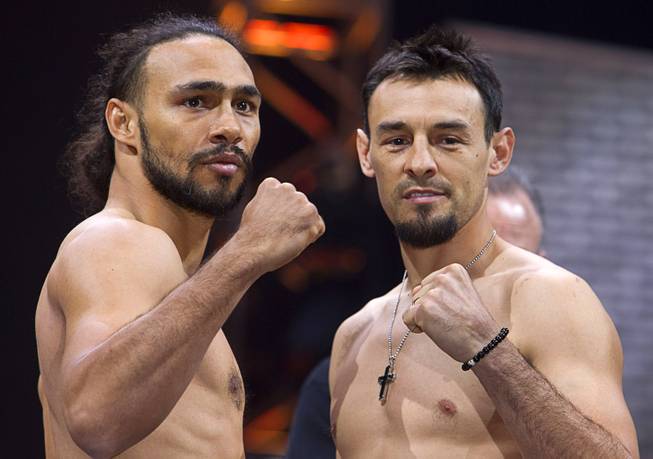 WBA welterweight champion Keith Thurman, left, of Clearwater, Fla. and Robert Guerrero of Gilroy, Calif. pose during an official weigh-in at the MGM Grand Garden Arena Friday, March 6, 2015. The fight will be broadcast live on NBC Sports Network Saturday, March 7.