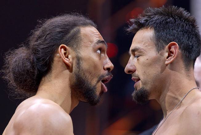 WBA welterweight champion Keith Thurman, left, of Clearwater, Fla. and Robert Guerrero of Gilroy, Calif. face off during an official weigh-in at the MGM Grand Garden Arena Friday, March 6, 2015. The fight will be broadcast live on NBC Sports Network Saturday, March 7.