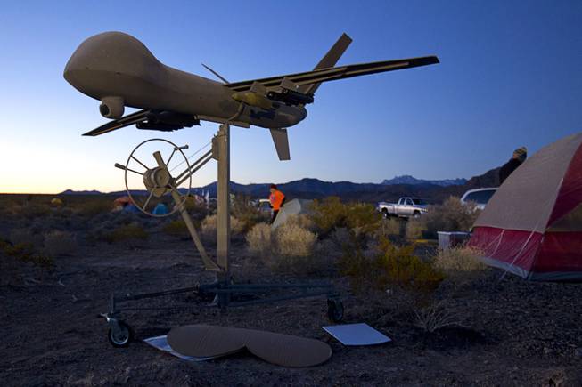 A drone model is shown at a protester encampment in the desert near Creech Air Force Base, about 50 miles northwest of Las Vegas, March 6, 2015. About 100 people came out for the protest organized by the peace group CODEPINK. .
