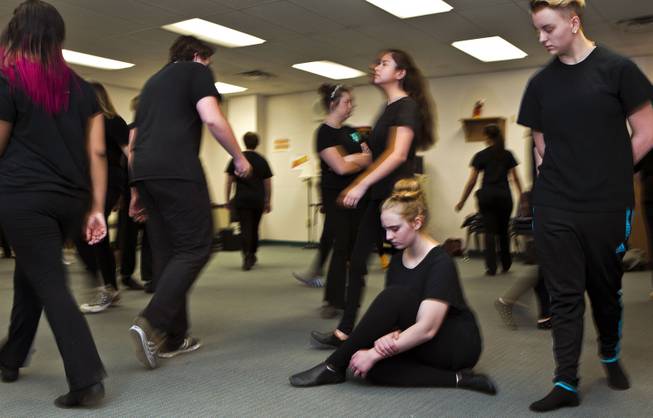 First-year theater student Elena Cellitti pauses while classmates wander in character during an exercise at the Las Vegas Academy of the Arts.