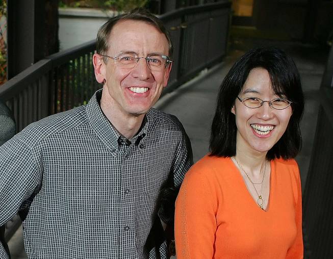 In this April 4, 2006, photo, Kleiner Perkins Caulfield and Byers senior partner John Doerr poses for a portrait with partner Ellen Pao outside of their office in Menlo Park, Calif. Doerr is scheduled to testify on Tuesday, March 3, 2015, in San Francisco Superior Court in a lawsuit against venture capital firm Kleiner Perkins Caufield & Byers. 