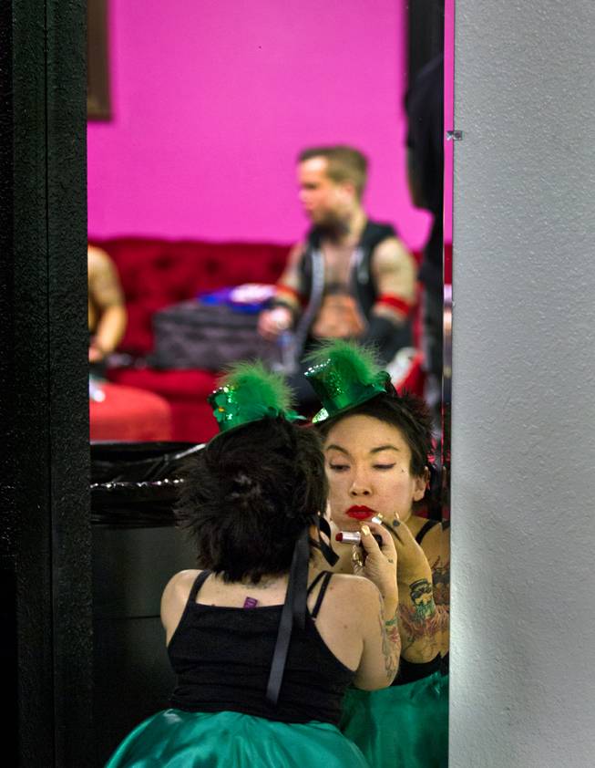 Firefly checks her makeup in the dressing room before entering the ring for the St. Patricks Day Leprechaun Smackdown by Midgets Unleashed at the Fremont Country Club on Tuesday, March, 17, 2015.