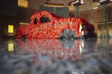 “La Sangre Nunca Muere” by Justin Favela and Sean Slattery is seen on display at the Clark County Government Center Monday, March 16, 2015 for their exhibit “Car Show”.