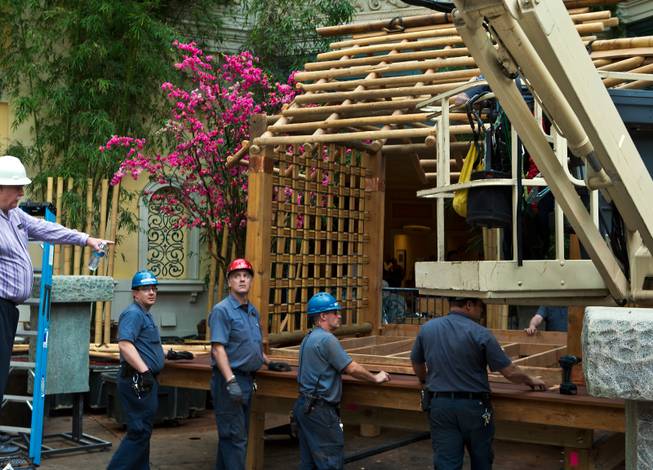 Pieces of a tea house are assembled as the Bellagio introduces a new Japanese-inspired spring conservatory display replacing the Chinese New Year on Wednesday, March, 18, 2015.