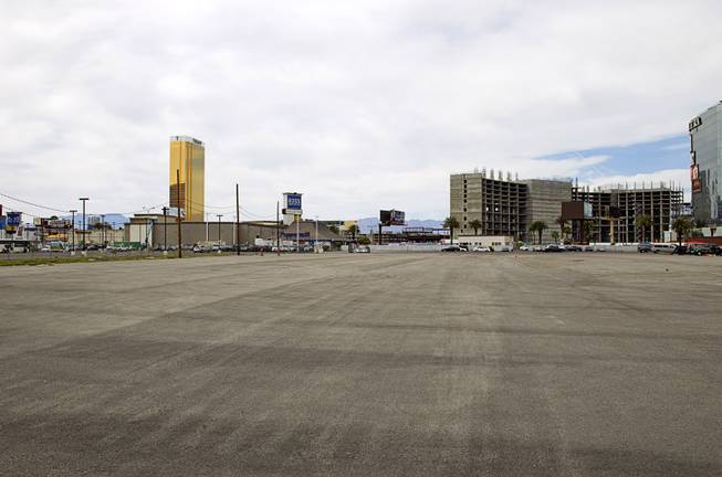 A view of an empty lot owned by development company Triple Five between the Peppermill Restaurant & Fireside Lounge and the Riviera Sunday, March 22, 2015.