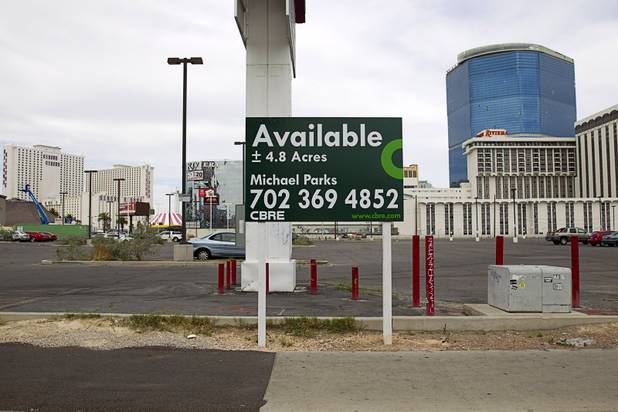 A sign lists available land at Las Vegas Boulevard and Convention Center Drive Sunday, March 22, 2015.