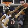 Duke’s Justise Winslow, left, blocks a shot by San Diego State’s J.J. O’Brien during the first half of an NCAA Tournament basketball game in the Round of 32 in Charlotte, N.C., on Sunday, March 22, 2015.