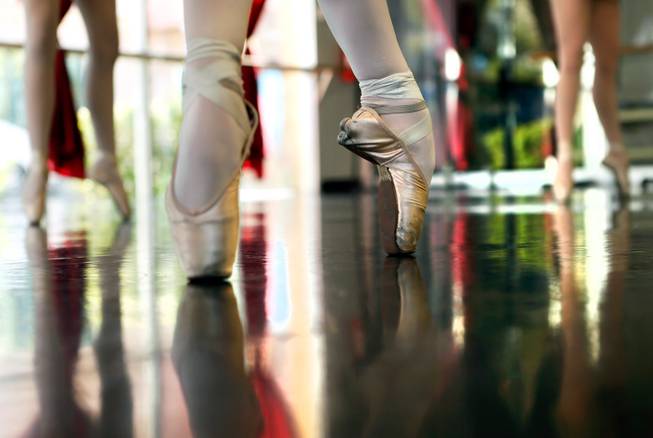 Ballerina Monika Haczkiewicz, 17, does bar exercises with others in dance class inside the Keith Kleven Institute on Wednesday, March, 4, 2015. She's going to New York City in April with instructor Tara Foy to compete for a chance to attend a prestigious dance school or join a ballet company.