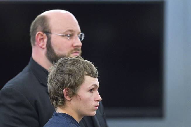 Erich Milton Nowsch Jr., foreground, stands by defense attorney Augustus Claus in court at the Regional Justice Center Thursday, March 26, 2015. Nowsch and co-defendant Derrick Andrews face charges related to the fatal Feb. 12 "road rage" shooting of Tammy Meyers.