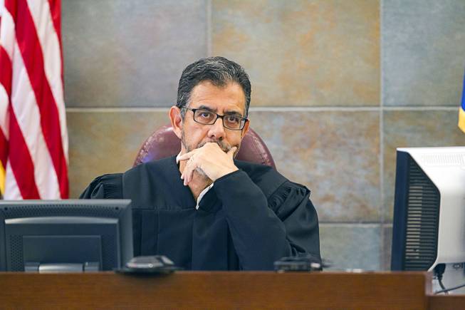 Judge Michael P. Villani listens to attorneys as Erich Milton Nowsch Jr. and co-defendant Derrick Andrews appear in court at the Regional Justice Center Thursday, March 26, 2015. Nowsch and Andrews faces charges related to the fatal Feb. 12 "road rage" shooting of Tammy Meyers.