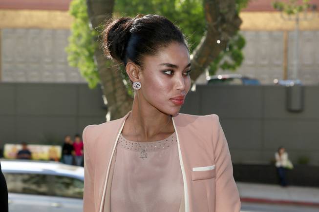 V. Stiviano, whose recording of former Los Angeles Clippers basketball team owner Donald Sterling led to him having to sell the team, arrives at Los Angeles Superior Court, Friday, March 27, 2015, in the lawsuit brought against her by Sterling's estranged wife, Shelly Sterling.