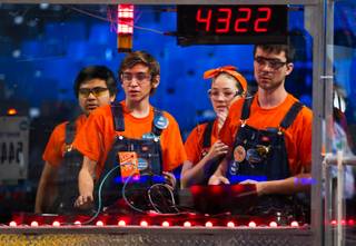 Team Clockwork Oranges of Orange, Calif., control their robot in the arena during a match at the FIRST Robotics Competition at the Cashman Center on Friday, March, 27, 2015.