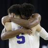 Duke's Justise Winslow and Tyus Jones (5) celebrate after a college basketball regional final game against Gonzaga in the NCAA Tournament on Sunday, March 29, 2015, in Houston. Duke won 66-52.