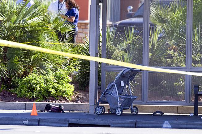 A child stroller is shown after a hit-and-run accident at a bus shelter on Sahara Avenue at Maryland Parkway Monday, March 30, 2015.