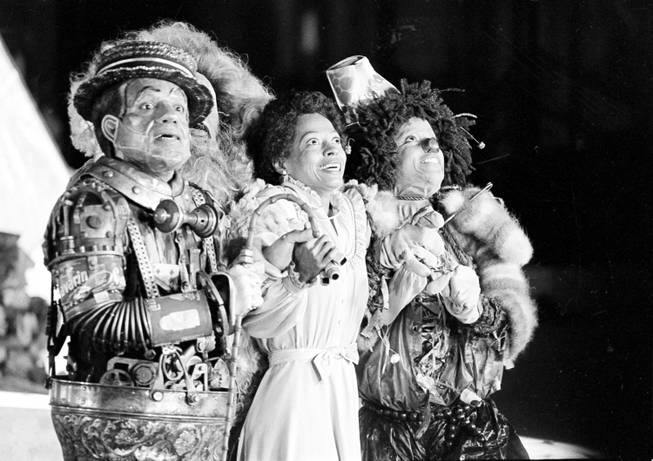 In this Oct. 4, 1977, file photo, Nipsey Russell as Tin Man, Diana Ross as Dorothy and Michael Jackson as Scarecrow film the musical "The Wiz" in New York's World Trade Center. Ted Ross, portraying the Lion, is partly hidden behind Russell. NBC on Dec. 3 will air a live production of the 1970s stage reinvention of "The Wizard of Oz," and Cirque du Soleil's new stage theatrical division will present "The Wiz" on Broadway for the 2016-17 season. 