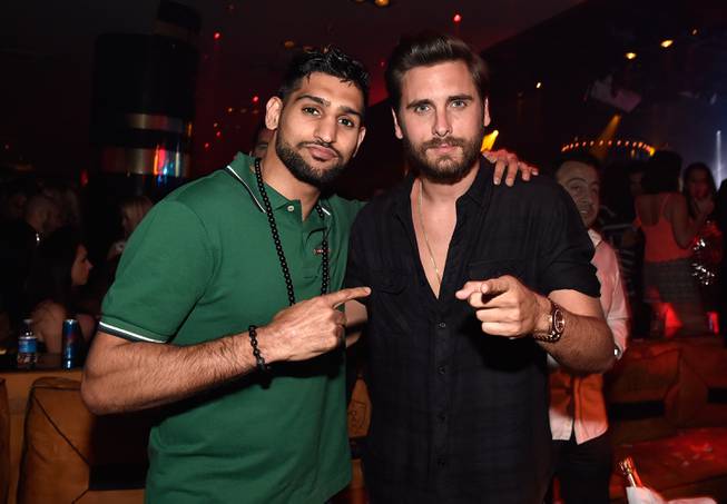 Scott Disick, right, with boxer Amir Khan, hosts at 1 ...