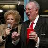 Mayor Carolyn Goodman, with husband former Mayor Oscar Goodman, excitedly announces her win and celebrates on election night Tuesday, April 7, 2015, during a party at her headquarters.