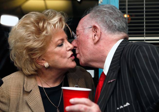 Mayor Carolyn Goodman shares a celebration kiss with husband Oscar on election night as she is officially reelected during a party at her campaign headquarters on Tuesday, April, 7, 2015.