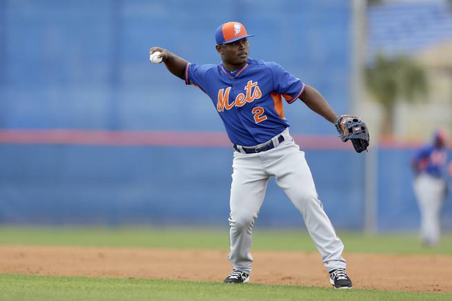 New York Mets prospect Dilson Herrera throws to first base during spring training Saturday, Feb. 21, 2015, in Port St. Lucie, Fla.