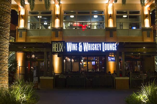 An exterior view of the Double Helix Wine & Whiskey Lounge in Town Square Sunday, April 12, 2015.   .