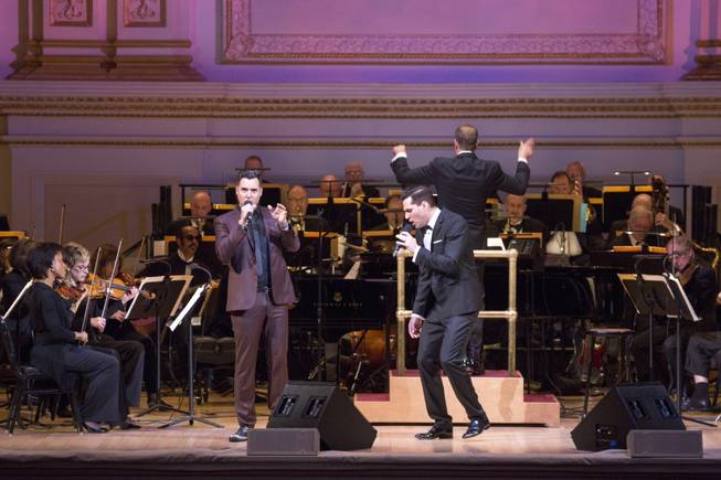 Las Vegas headliner Frankie Moreno and Ryan Silverman perform during the "Let's Be Frank" show with the New York Pops at Carnegie Hall on Friday, April 10, 2015, in New York City. New York Pops Music Director Steven Reineke directed the orchestra.