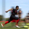 Brannon Flowers of Desert Oasis runs the 40-yard dash during the Phase 1 Sports Football Combine and Skills Camp at Faith Lutheran High School Sunday, April 12, 2015.  