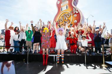 Drag queens dance during the Guinness World Records largest drag queen stage show performance at the Hard Rock Cafe in Las Vegas on Sunday, April 12, 2015.