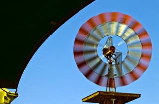 A windmill spins top speed at the Western Trails Neighborhood Park winds in the Las Vegas area are predicted to reach as high as 50 mph on Tuesday, April, 14, 2015.