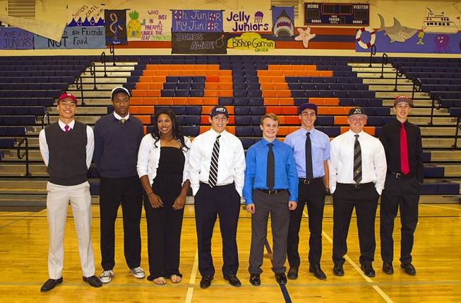 Student-athletes pose during a signing day ceremony at Bishop Gorman High School Wednesday, April 15, 2015. From left: Richie Thorton, Nick Blair, Jasmine Gibson, Nik Galvan, Sean Randles Jr., Andrew Gonzalez, Matt Hudgins, and Chase Maddux.  .