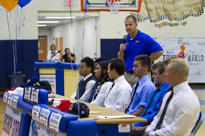 Basketball coach Grant Rice speaks during a signing day ceremony at Bishop Gorman High School Wednesday, April 15, 2015. Eight student-athletes signed national letters of intent.  .