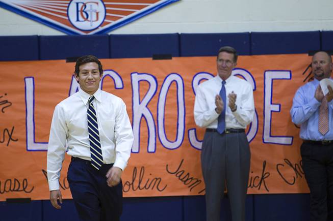 Swimmer Nik Galvan is introduced during a signing day ceremony at Bishop Gorman High School Wednesday, April 15, 2015. Eight student-athletes signed national letters of intent.  .