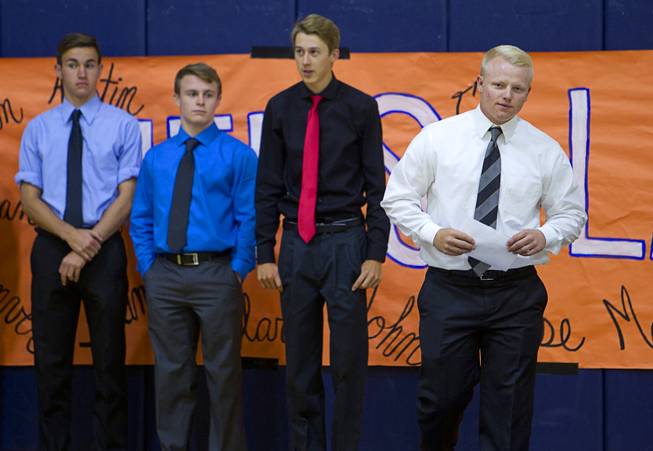 Baseball player Matt Hudgins, right, is introduced during a signing day ceremony at Bishop Gorman High School Wednesday, April 15, 2015. Eight student-athletes signed national letters of intent.  .