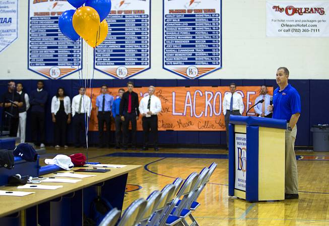 Basketball coach Grant Rice introduces student-athletes during a signing day ceremony at Bishop Gorman High School Wednesday, April 15, 2015. Eight student-athletes signed national letters of intent.  .