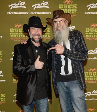 Jesse Lenat and Uncle Si Robertson attend the grand opening of “Duck Commander Musical” on Wednesday, April 15, 2015, at the Rio.
