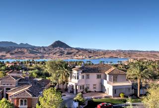 In a far away land known as Lake Las Vegas sits 16 Via Potenza Court, a three-bedroom, seven-bathroom mansion.