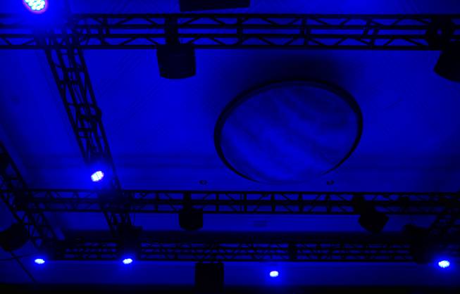 Speakers hang about the room and ceiling as part of a demo from Dolby Atmos at the trade show during the the star-studded CinemaCon Convention officially run by the National Association of Theatre Owners (NATO) at Caesars Palace on Tuesday, April 21, 2015.