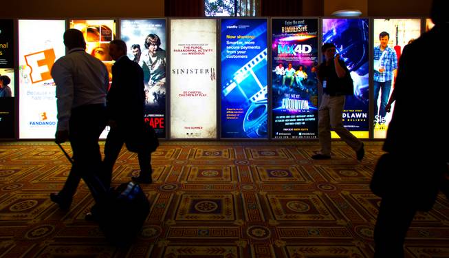 Attendees depart after another day of the star-studded CinemaCon Convention officially run by the National Association of Theatre Owners (NATO) at Caesars Palace on Tuesday, April 21, 2015.