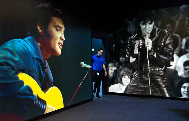 Classic Elvis photos greet visitors now hanging within Gracelands first-ever permanent exhibition outside of Memphis and in the Westgate Resorts on Thursday, April 23, 2015.
