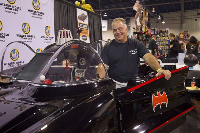 Exhibitor Bill Anderson poses with a 1966 Batmobile replica created by Authentic Kustoms, a car shop in Pittsburgh, Penn., during the 2015 Wizard World Comic Con Las Vegas in the Las Vegas Convention Center Sunday, April 26, 2015. The replica is based from a 1979 Lincoln Towncar.