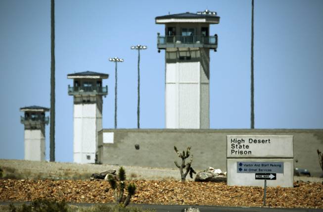 This April 15, 2015, photo shows guard towers at High Desert State Prison in Indian Springs.