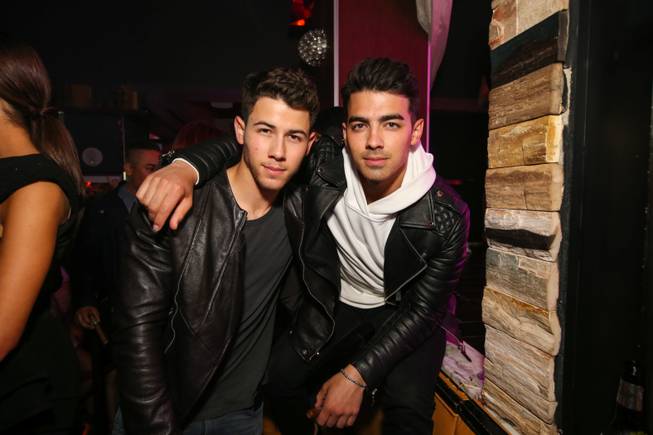 Nick Jonas, left and with brother Joe Jonas, celebrates the ...