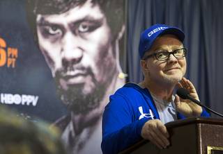 Manny Pacquiao's trainer Freddie Roach listens to a reporter's question at the MGM Grand Thursday, April 30, 2015. Undefeated WBC/WBA welterweight champion Floyd Mayweather Jr. and WBO welterweight champion Manny Pacquiao of the Philippines will meet in a welterweight unification fight at the MGM Grand Garden Arena on Saturday.