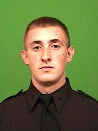 This undated photo released by the New York City Police Department shows officer Brian Moore. Moore, a New York City police officer shot in the head and critically injured while attempting to stop a man suspected of carrying a gun, is recovering following brain surgery. Detectives were still investigating Sunday, May 3, 2015, after arresting 35-year-old Demitrius Blackwell in the shooting.