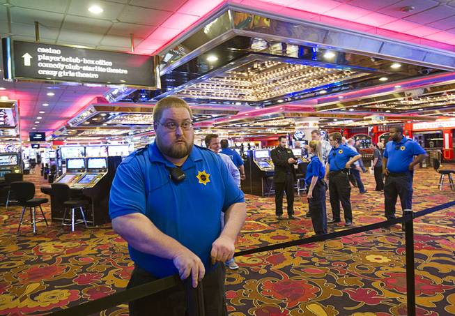 12:24 p.m. - A Riviera security officer closes off the casino floor at the Riviera Monday, May 4, 2015. 