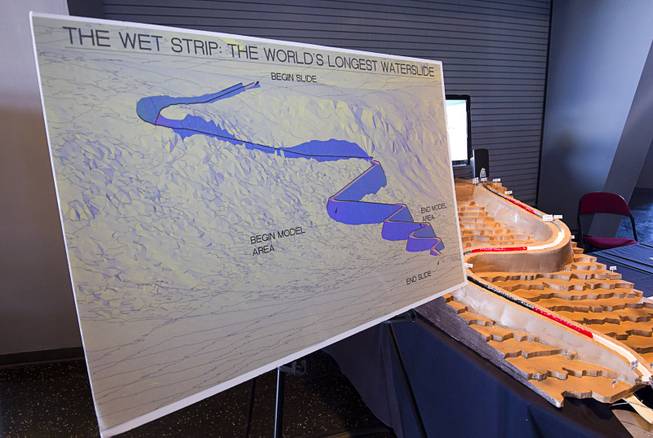 A illustration of the Wet Strip water slide is displayed during the Fred and Harriet Cox Senior Design Competition at UNLV Thursday, May 7, 2015. The slide, if built, will be the longest water slide in the world. (The model, background, shows only a portion of the slide.)