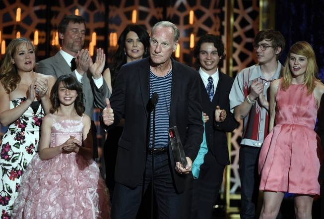 In a Saturday, April 11, 2015 file photo, Craig T. Nelson, center, and the cast of "Parenthood" accept the fan favorite award at the TV Land Awards at the Saban Theatre in Beverly Hills, Calif. NBC released next season's schedule Sunday, May 10, 2015. 