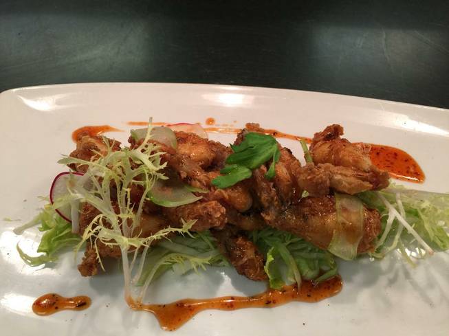 Buttermilk-fried Florida frog legs with spicy Creole tomato glaze are ...